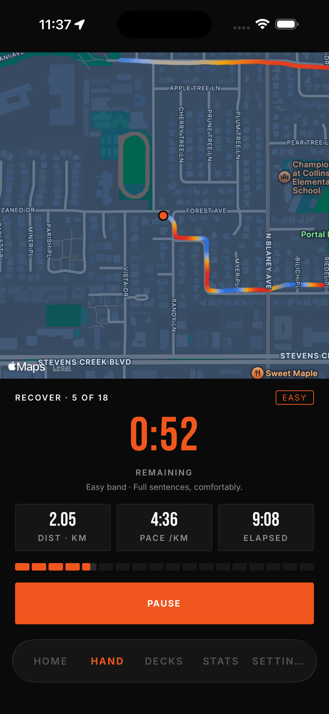 A live run session: a map of Central Park with the route traced in orange, a two-minute-twenty-six countdown for the warm-up segment, and distance, pace and elapsed time below it.